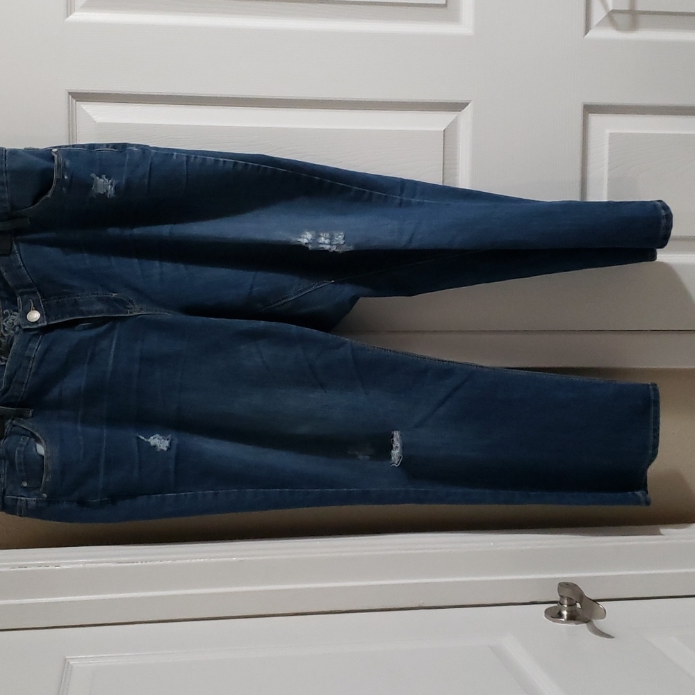 Distressed blue jeans